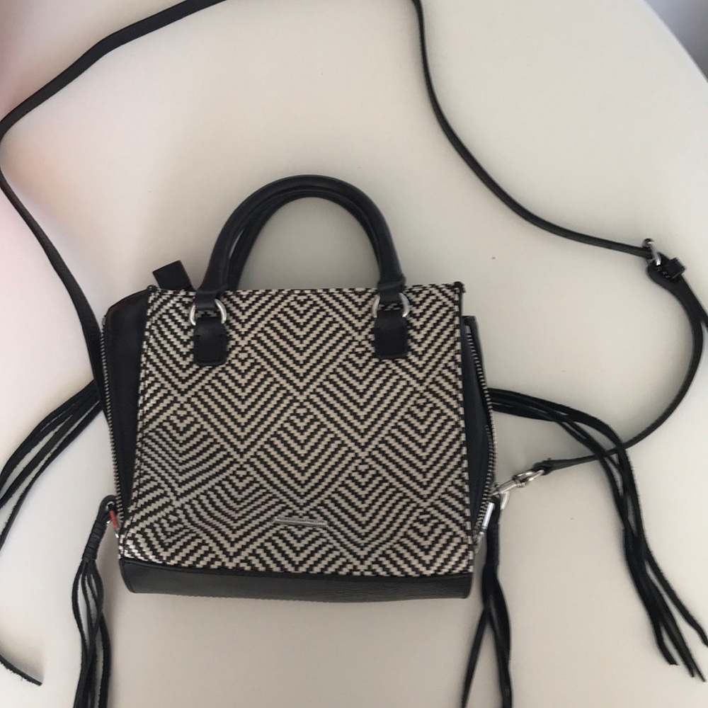 A Rebecca Minkoff black/off white fringe purse